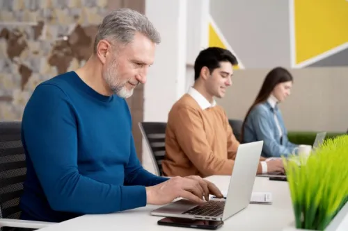Professionals at work reflecting diversity, expertise, and digital transformation at Sofrecom