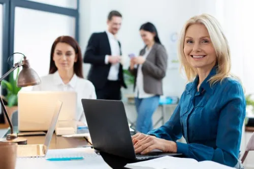 Team collaboration in an office setting, symbolizing Sofrecom’s presence and media recognition

